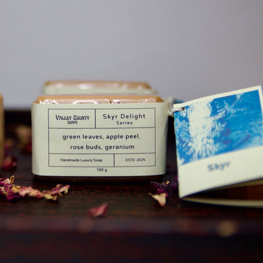 Soap labeled 'Skyr Delight' with decorative elements on a dark surface